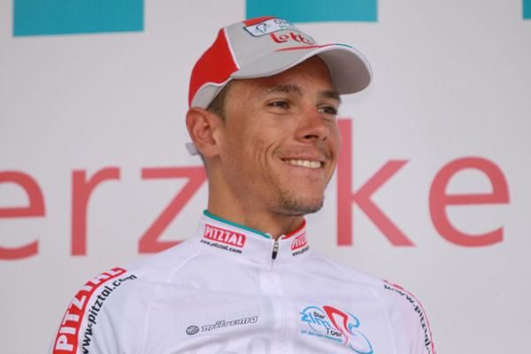 Philippe Gilbert (Omega Pharma-Lotto) is a happy man as he awaits his final leader's jersey.