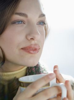 Woman drinking coffee - Marie Claire news