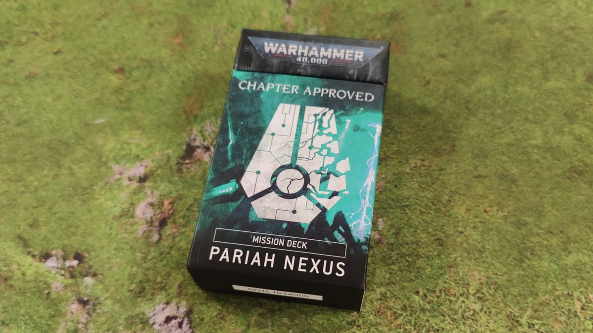 The Pariah Nexus Mission Deck pack on a grassy mat