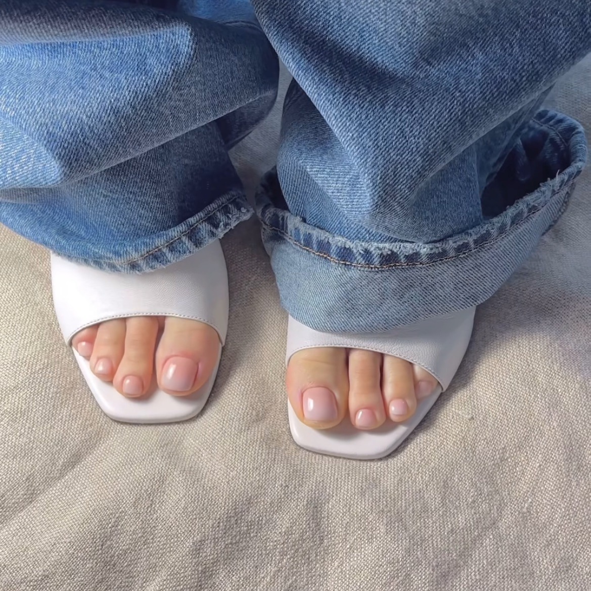A pedicure with a pink and white ombre