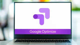 Laptop computer displaying logo of Google Optimize, a website optimization tool that helped online marketers and webmasters increase visitor conversion