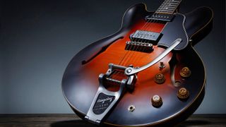 Gibson ES-335 on a dark background