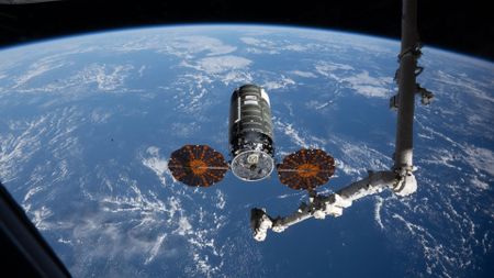 Northrop Grumman&rsquo;s Cygnus XL cargo spacecraft the S.S. Steven R. Nagel rests at its capture point on April 13, 2026, 12 meters from the International Space Station, as the Canadarm2 robotic arm prepares to grapple it.