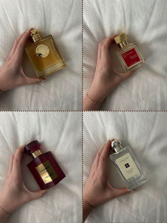 Junior beauty editor Grace Lindsay holding a selection of the best autumn perfumes