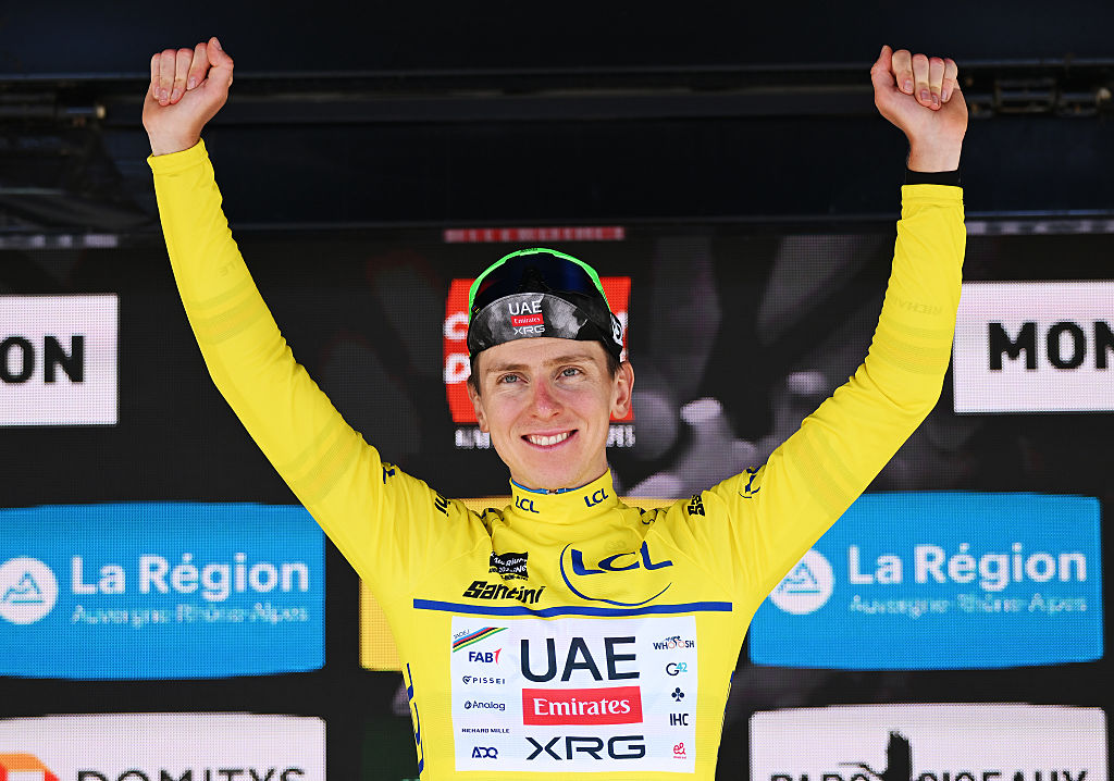 Tadej Pogacar on the podium in the maillot jaune