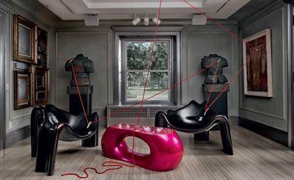 The living room of his Scottsville house, Wendell Castle’s fibreglass ‘Black Widow’ chairs.