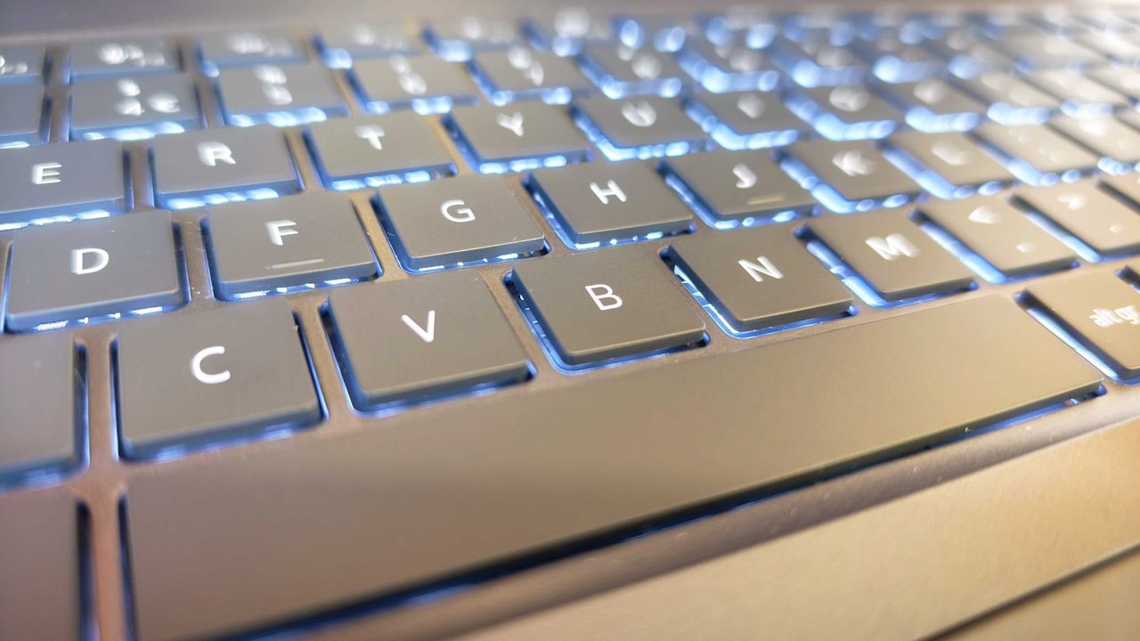 A Dell Pro Max 18 Plus laptop on a wooden desk