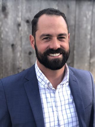 Smiling headshot of Mike Libman.