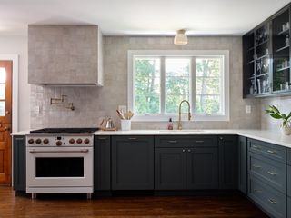 A kitchen with zellige wall tiles