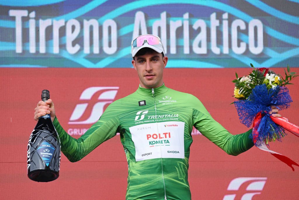 FOLLONICA ITALY MARCH 05 Davide Bais of Italy and Team PoltiKometa celebrates at podium as Green Mountain Jersey winner during the 59th TirrenoAdriatico 2024 Stage 2 a 198km stage from Camaiore to Follonica UCIWT on March 05 2024 in Follonica Italy Photo by Tim de WaeleGetty Images