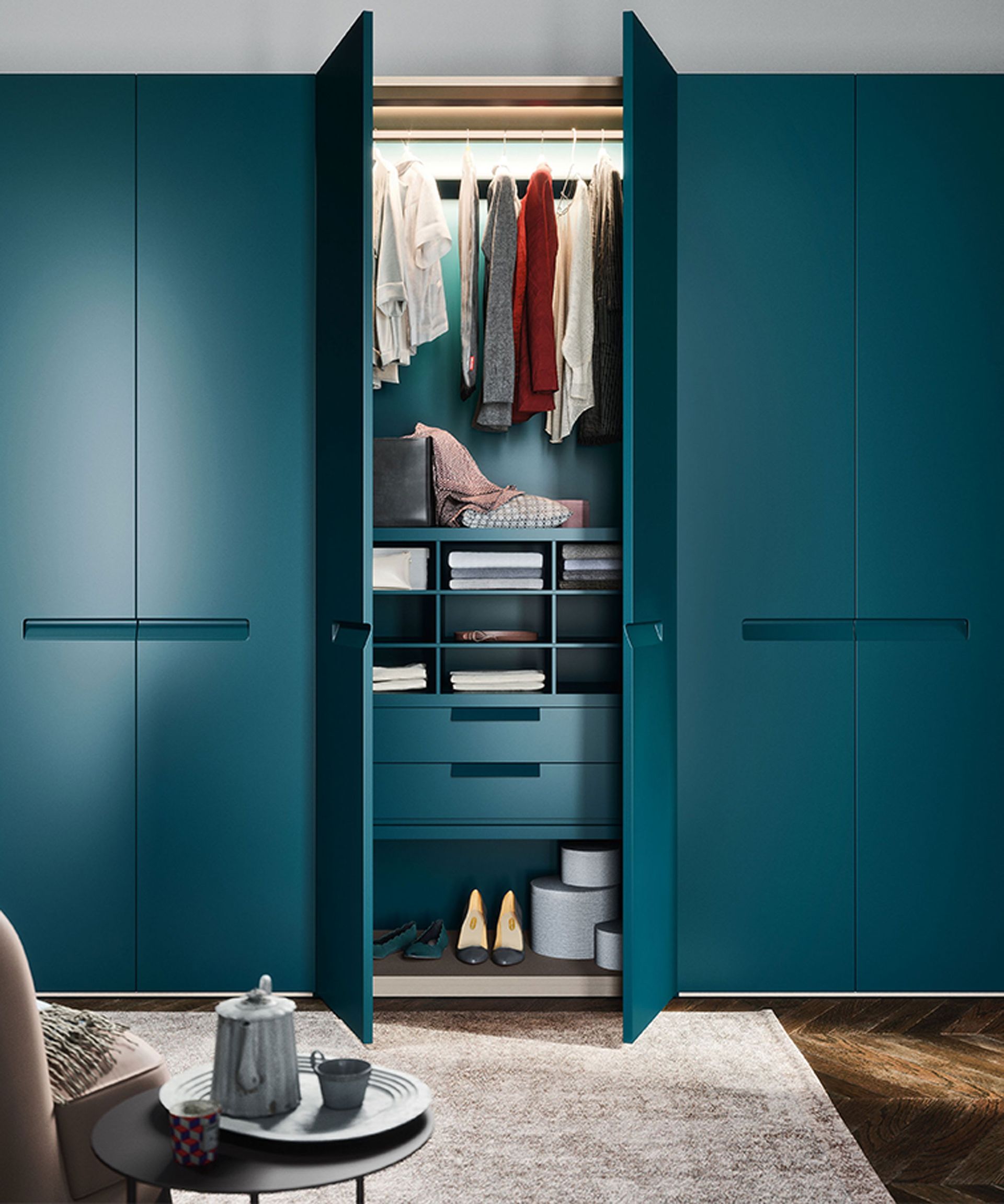 Bedroom with custom wardrobes in blue