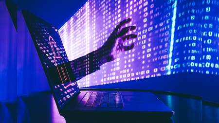 a hand reaching out of a laptop screen