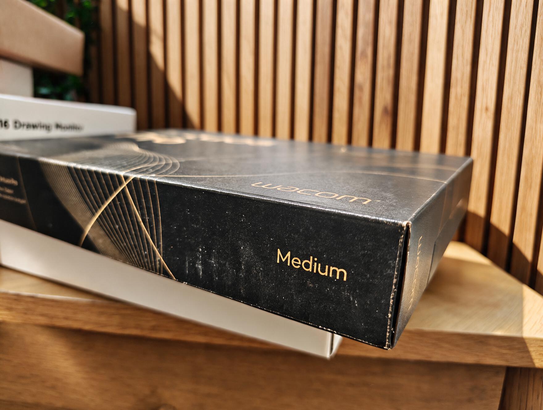 Boxed drawing tablets on a desk