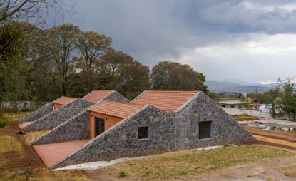 Mexican house exterior with stone walls