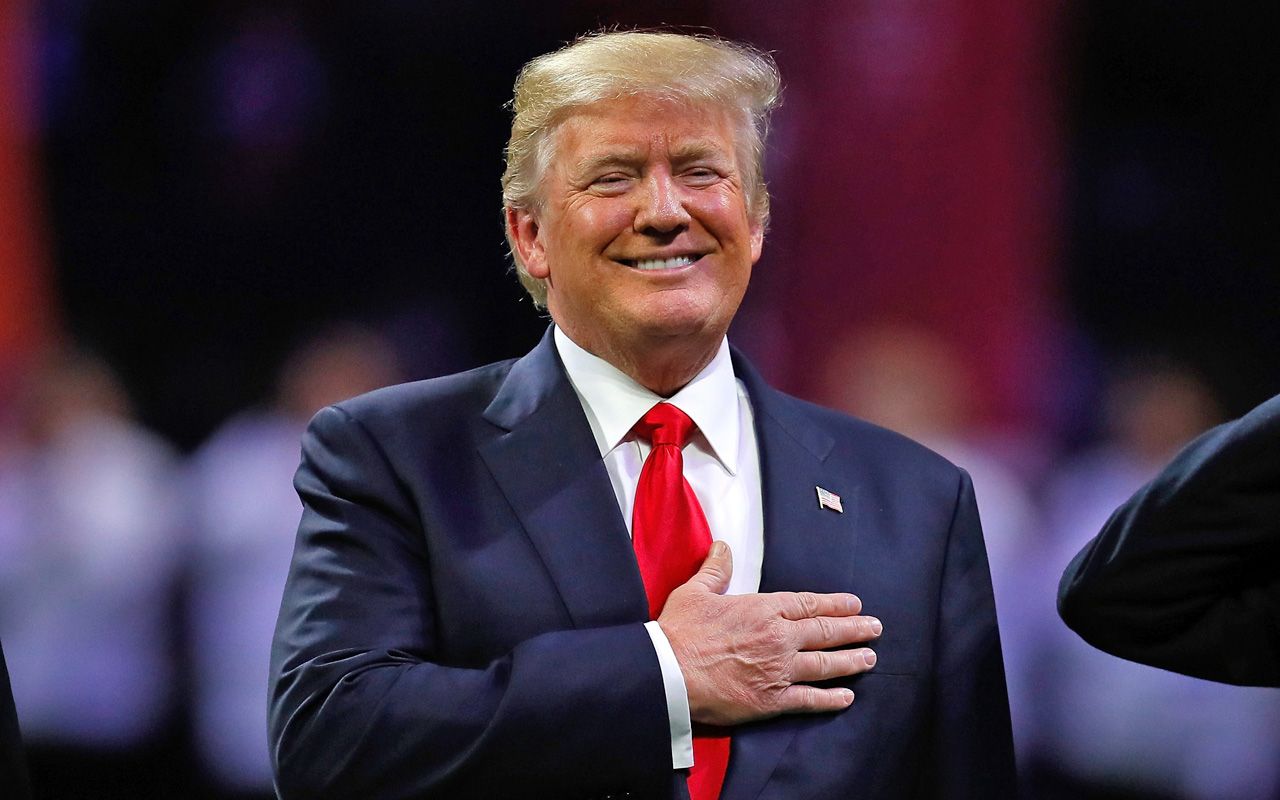 ATLANTA, GA - JANUARY 08:U.S. President Donald Trump on field during the national anthem prior to the CFP National Championship presented by AT&amp;amp;T between the Georgia Bulldogs and the Alabama 