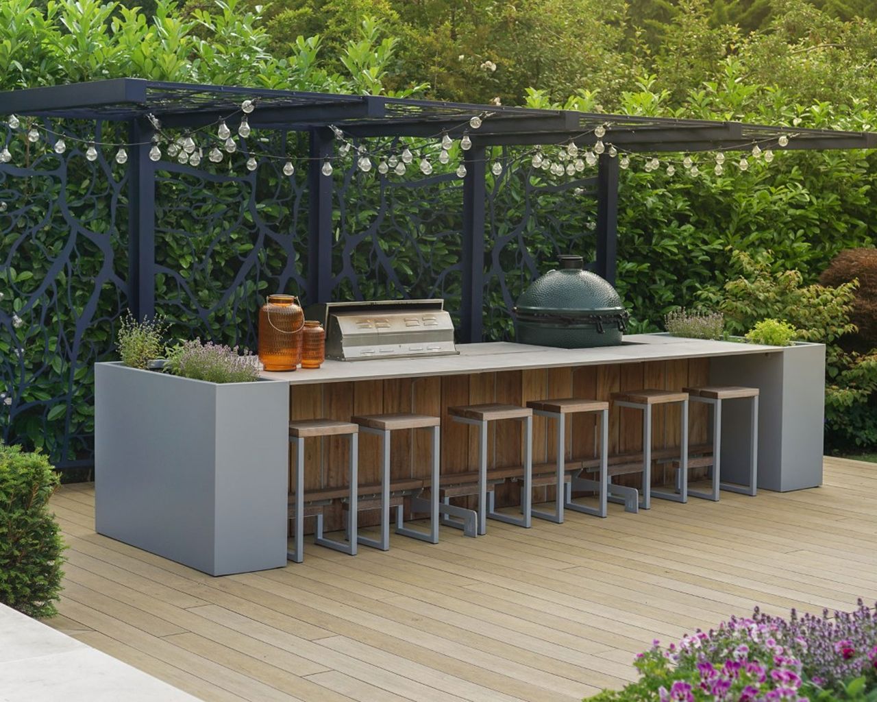 bbq area under pergola on deck