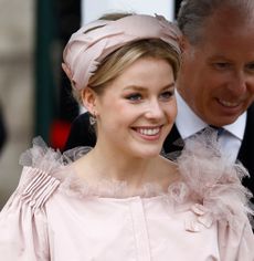 Margarita Armstrong-Jones wearing a pink headband and dress