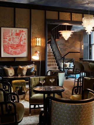 The plush interiors of NoMad Hotel bridge the gap between past and present through transitional style design punctuated by Art Deco accents and upholstered seating.