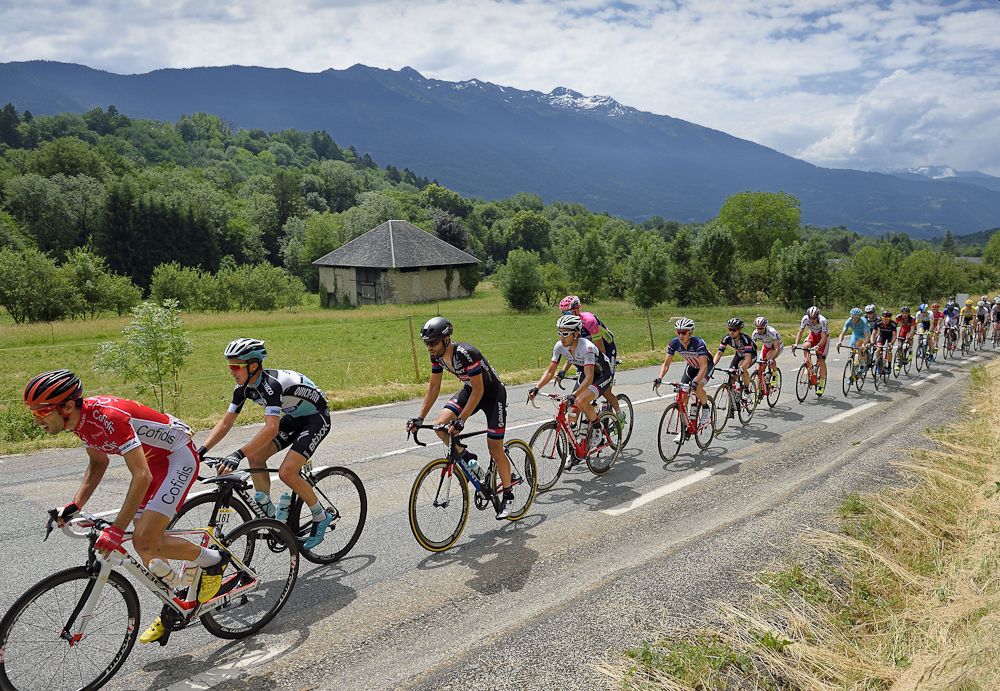 The pack rides during the 131.5 km first stage of the 67th edition of the Criterium Dauphine.