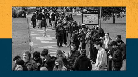 Staff and students queue to receive antibiotics at the University of Kent in Canterbury on March 16, 2026. 