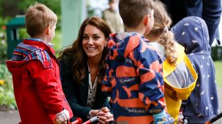 Kate Middleton talking to children