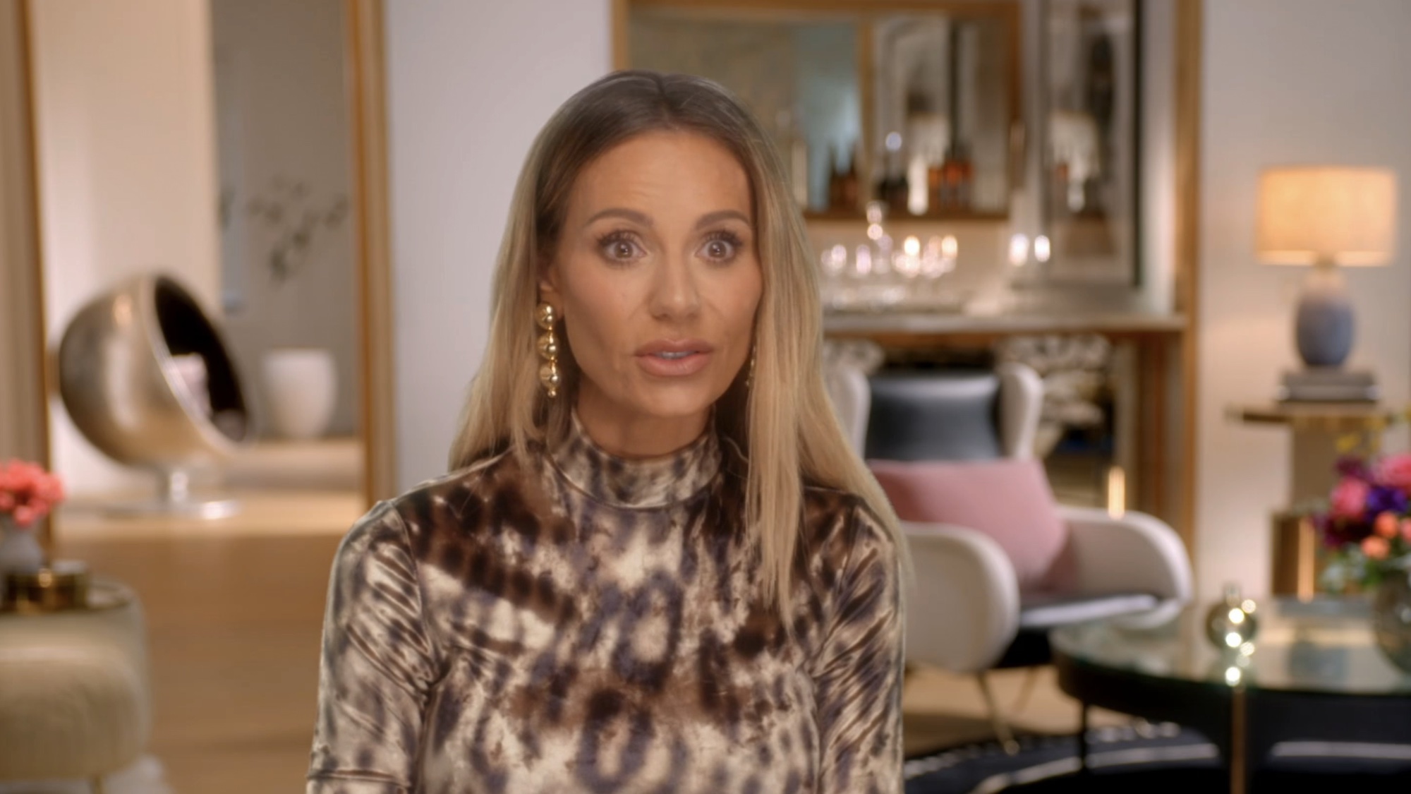 Dorit wearing leopard print in a RHOBH Season 15 confessional.