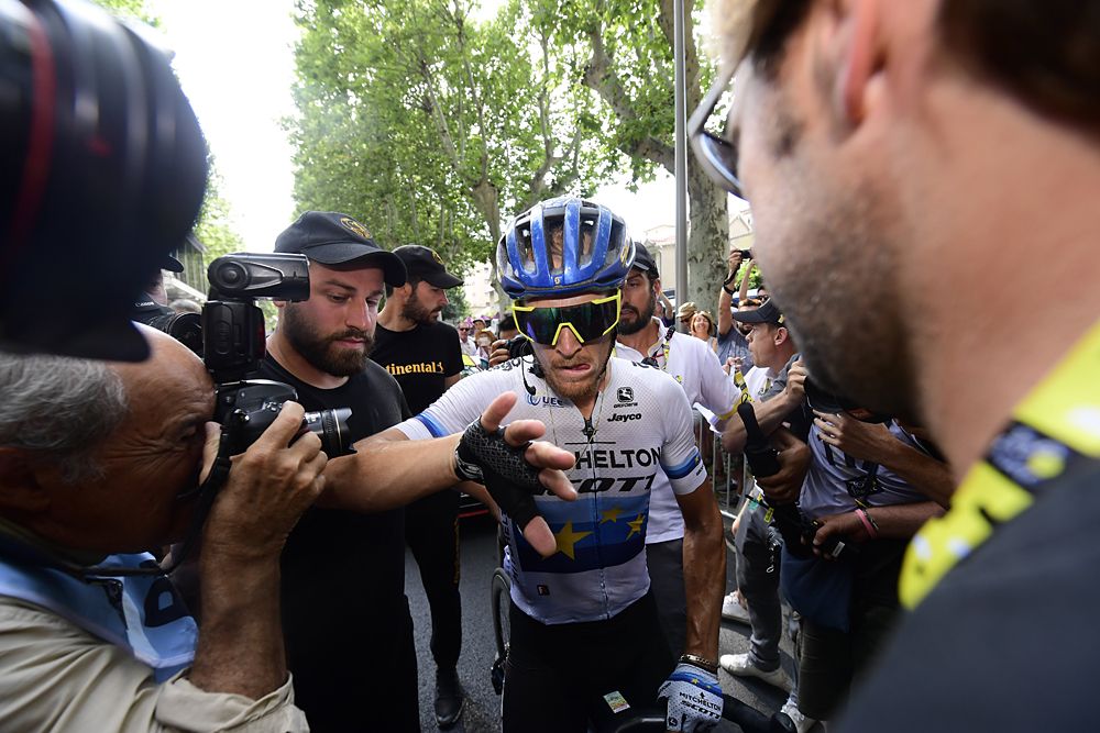 Matteo Trentin (Mitchelton-Scott) celebrates a solo victory on stage 17 at the Tour de France
