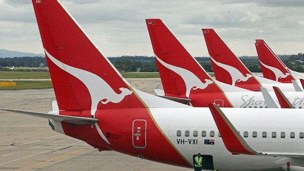 MELBOURNE, AUSTRALIA - OCTOBER 31:Luggage is loaded onto a Qantas aeroplane at Melbourne Airport on October 31, 2011 in Melbourne, Australia. Qantas flights are expected to return to the skie