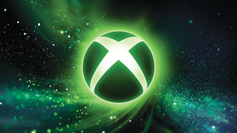 Xbox logo illuminated in vibrant green against a cosmic, swirling background of green and black, conveying energy and excitement.