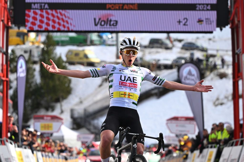 PORT AINE SPAIN MARCH 20 Tadej Pogacar of Slovenia and UAE Emirates Team Green Leader Jersey celebrates at finish line as stage winner during the 103rd Volta Ciclista a Catalunya 2024 Stage 3 a 1767km stage from Sant Joan de les Abadesses to Port Aine 1967m UCIWT on March 20 2024 in Port Aine Spain Photo by David RamosGetty Images