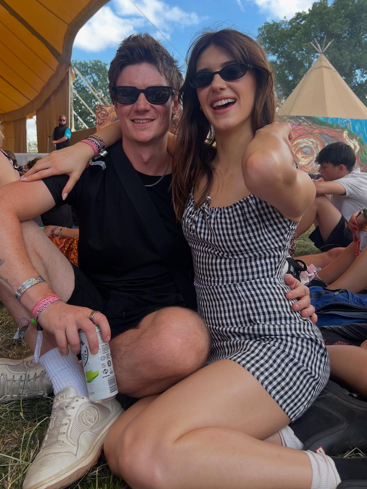Daisy Edgar Jones at Glastonbury Festival wearing Hunter rain boots.