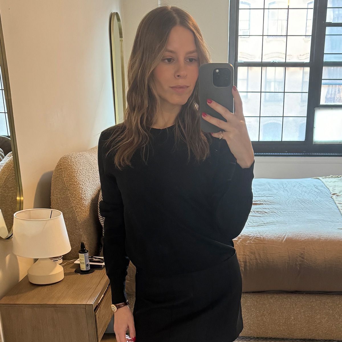 Nikki wears the amazon anrabess sweater in black.