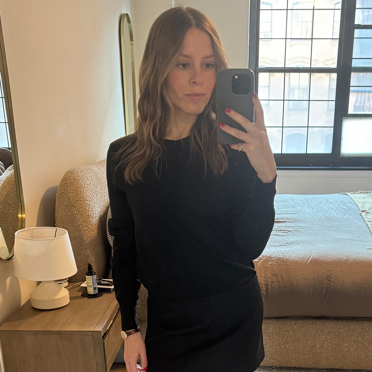 Nikki wears the amazon anrabess sweater in black.
