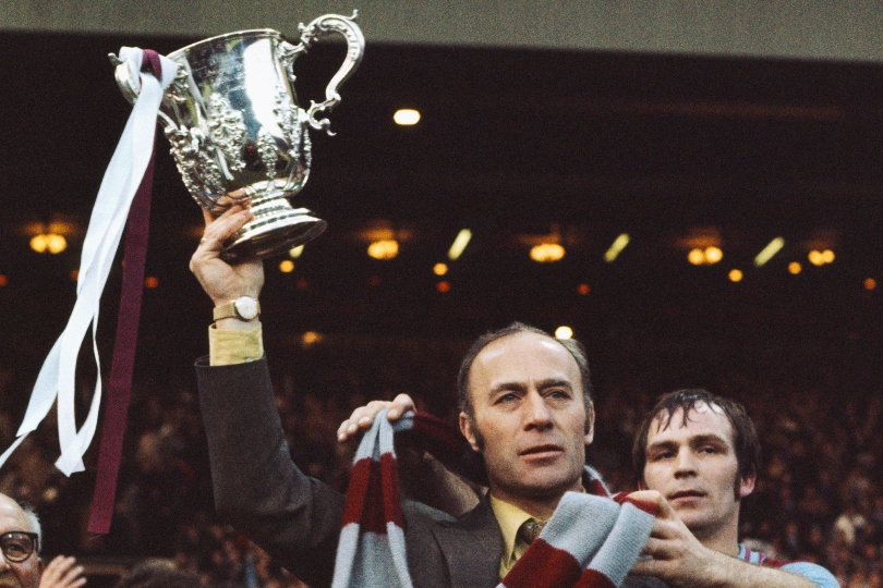 Aston Villa manager Ron Saunders and captain Ian Ross celebrate the club's League Cup final win over Norwich City in March 1975.