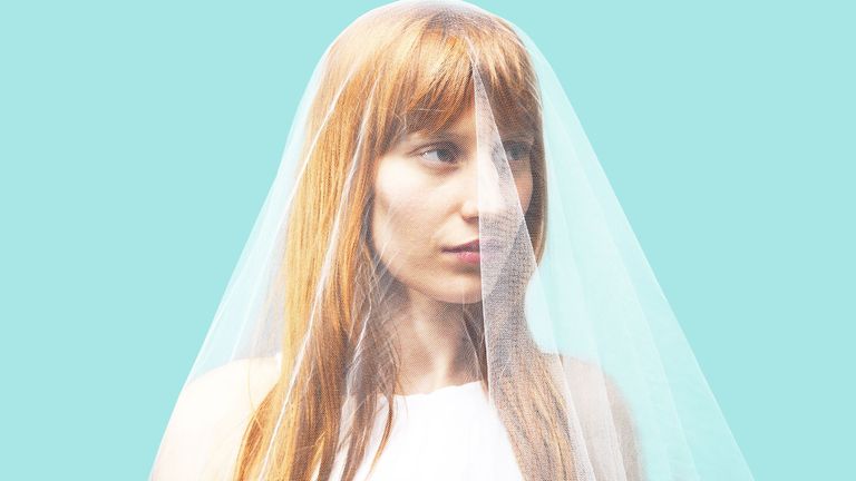 Bridal veil, Veil, Hairstyle, Skin, Eyebrow, Textile, Photograph, Bridal clothing, Bride, Wedding dress,