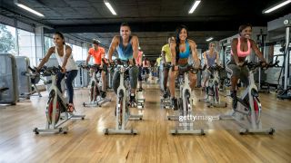 Recumbent bikes vs stationary bikes: image of exercise bike class