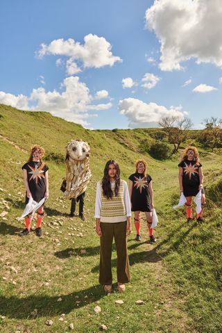 group of boss morris creatives modelling white stuff knitwear