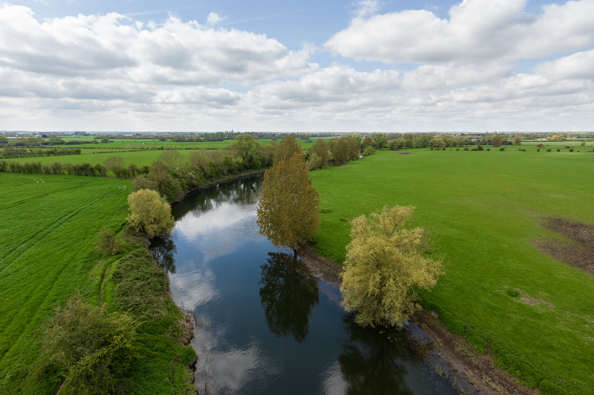 DJI Inspire 3 aerial image of river and green landscape