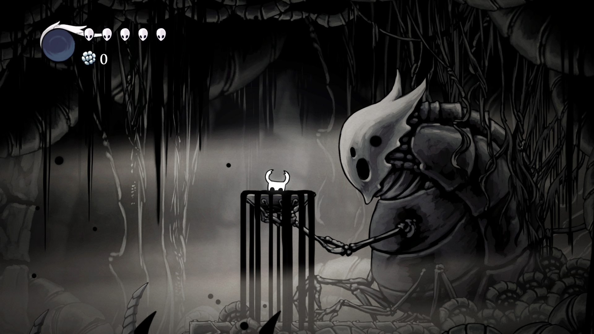A monochromatic black and white area in Hollow Knight - almost like its drawn in charcoal, where the Knight stands in front of the husk of an ancient beast, a giant bug