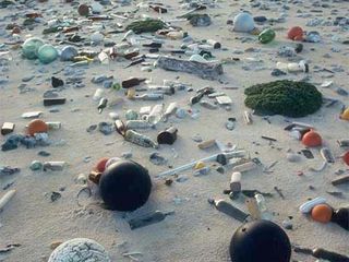 Garbage on the east shore of Laysan Island in Hawaii, circa August-November 1990, as captured by photographer Milo Burcham. Home to the capital city and nearly a million people, the island of Oahu in the U.S. state of Hawaii.