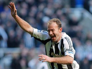 Newcastle United's Alan Shearer celebrates breaking Jackie Milburn's goalscoring record during the English Premiership soccer match against Portsmouth at St James' Park in 2006.