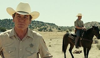 Tommy Lee Jones as Ed Tom Bell investigating the shootout in No Country For Old Men