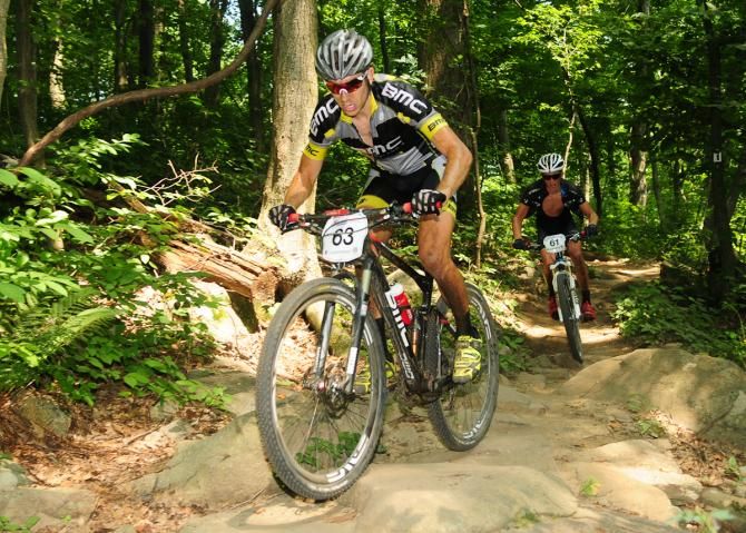 Kerry Werner (BMC Development MTB Team) attacking the descent on lap three with the race lead