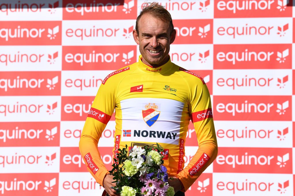 KILPISJARVI FINLAND AUGUST 06 Alexander Kristoff of Norway and Team Norway Yellow Leader Jersey celebrates at podium during the 8th Arctic Race Of Norway 2021 Stage 2 a 178km stage from Nordkjosbotn to Storfjord Kilpisjrvi Finland ArcticRace on August 06 2021 in Kilpisjarvi Finland Photo by Stuart FranklinGetty Images