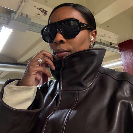 An image of a woman wearing best under 200 fall accessories
