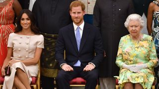 Meghan, Duchess of Sussex, Prince Harry, Duke of Sussex and Queen Elizabeth II at the Queen's Young Leaders Awards Ceremony