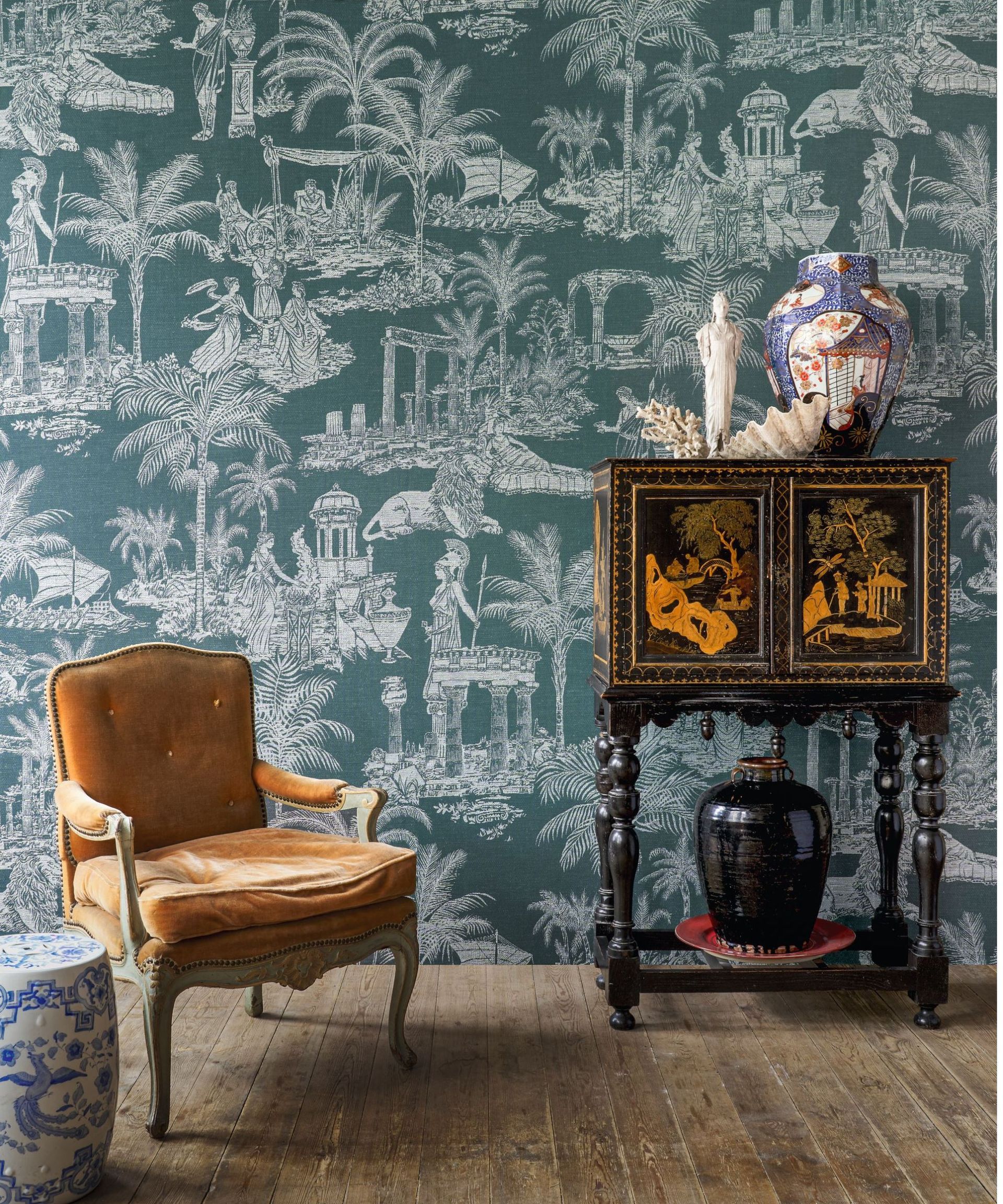 Blue toile wallpaper French decor behind chair and buffet