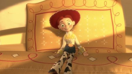 Jessie as toy leaning against a pillow in Toy Story 5