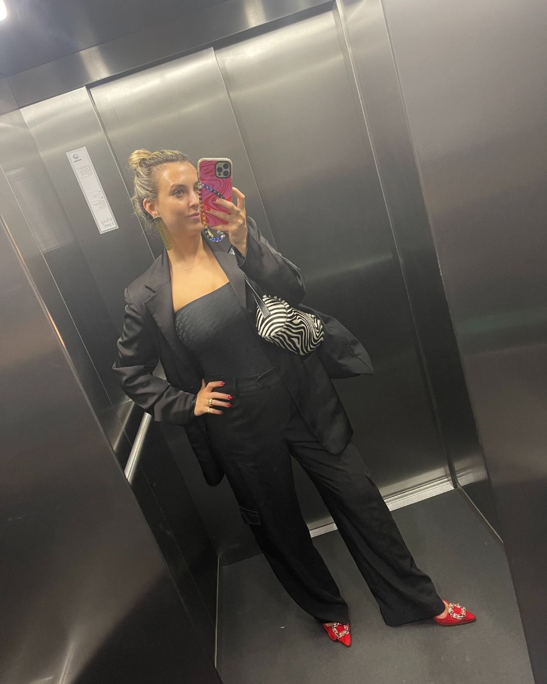 Clementina Jackson wears a tailored jacket and trousers