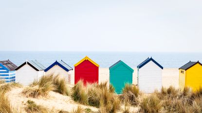 UK staycation: beach huts on a clear day